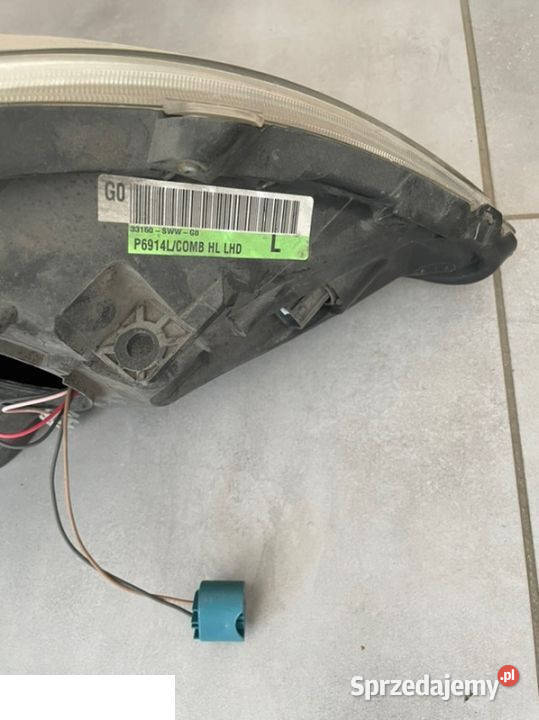 Honda CrV III reflektor lewy przód zwykły Kozubszczyzna