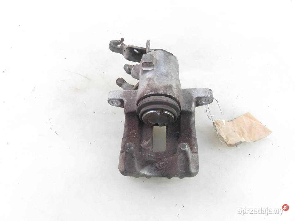 ZACISK LEWY TYŁ VW GOLF V 19 TDI Zaciski i jarzma małopolskie