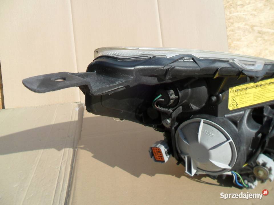Subaru Legacy Outback 09 Xenon Reflektor Lewy Lampy przednie Nowy Tomyśl