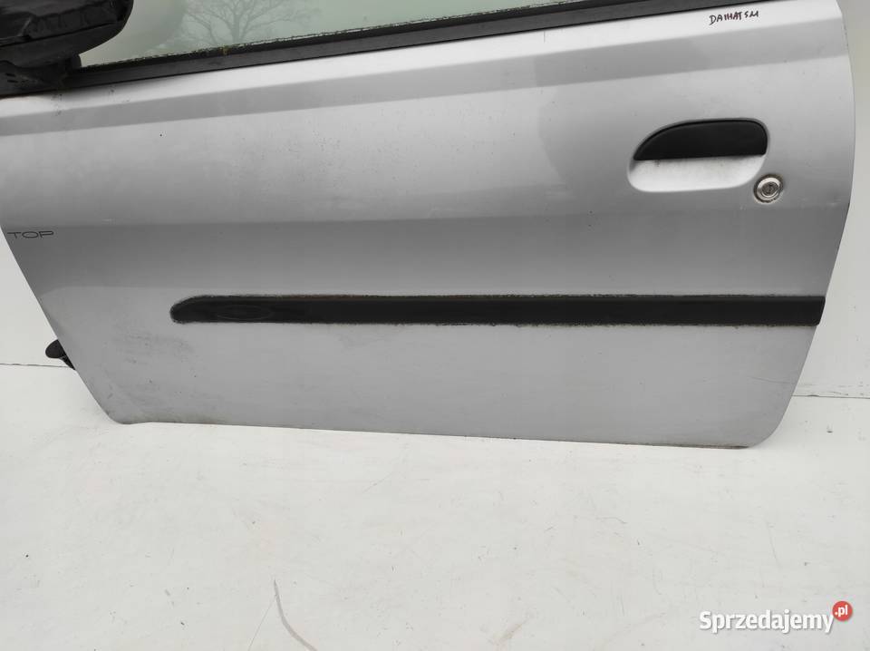 DRZWI LEWY PRZÓD DAIHATSU CUORE VI L251 0307 3D osobowe Nowy Tomyśl sprzedam