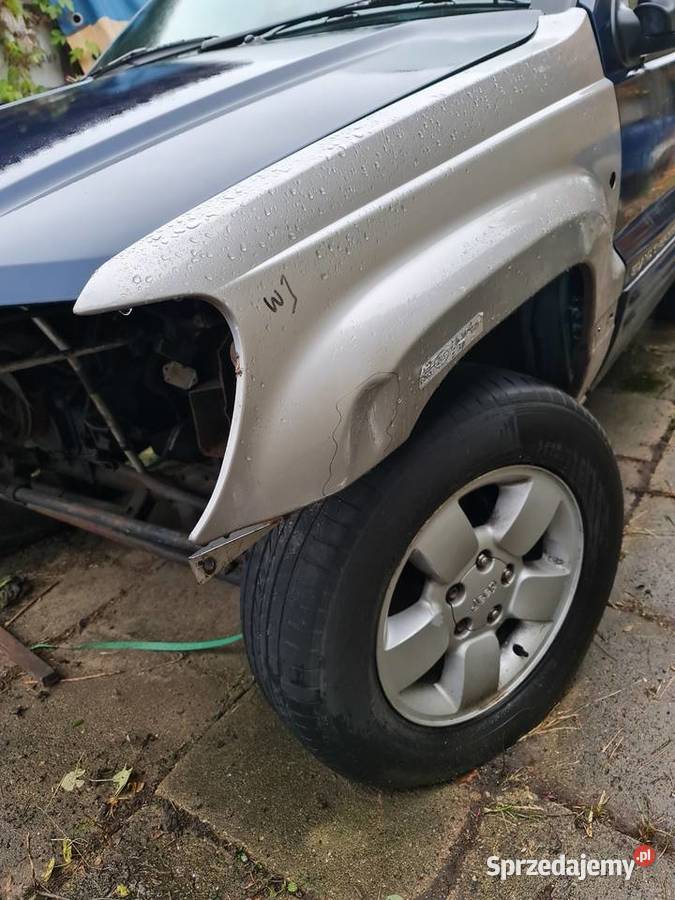 Jeep Grand Cherokee WJ błotnik L przód osobowe Błotniki Białystok