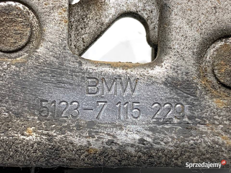 ZAMEK MASKI LEWY BMW E64 Kabriolet 7115228 0410