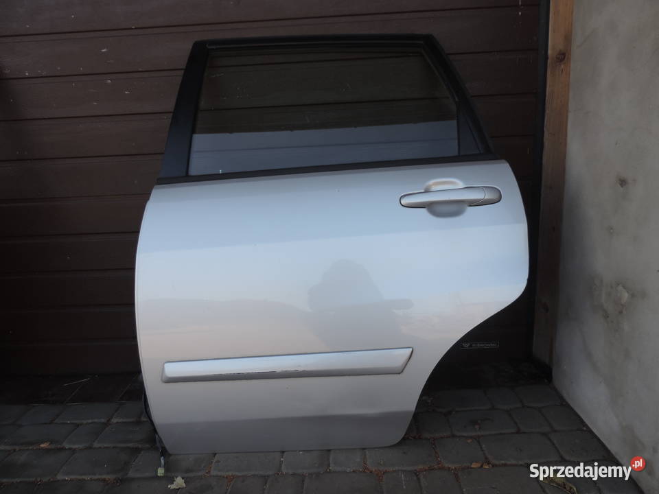 DRZWI LEWY TYŁ PRZEDNIE SUZUKI LIANA HB Z2S Nowy Sącz