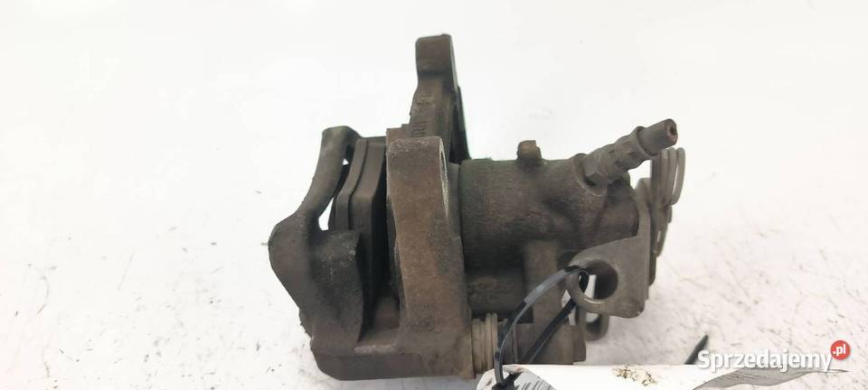 ZACISK HAMULCOWY TYŁ PRAWY RENAULT TRAFIC III osobowe