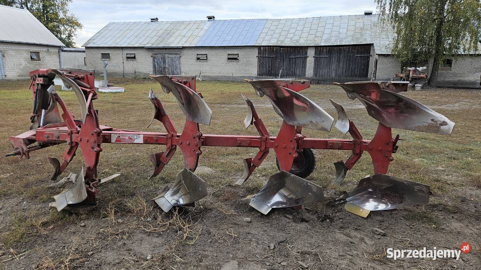 Pług obrotowy czteroskibowy z przedpłużkami