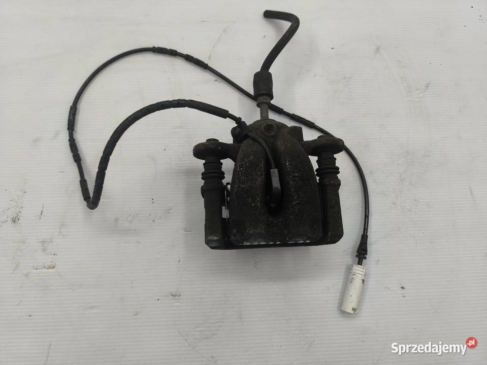 ZACISK LEWY PRZÓD BMW 1 E87 E81 LIFT 16 osobowe