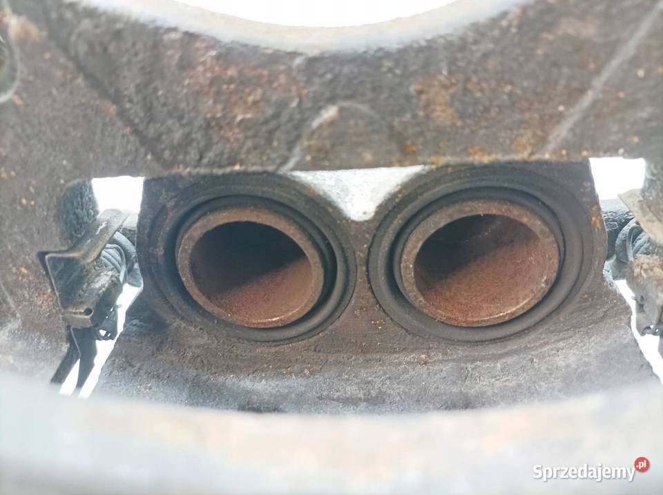 ZACISK HAMULCOWY LEWY PRZÓD 20 T 210 Infiniti