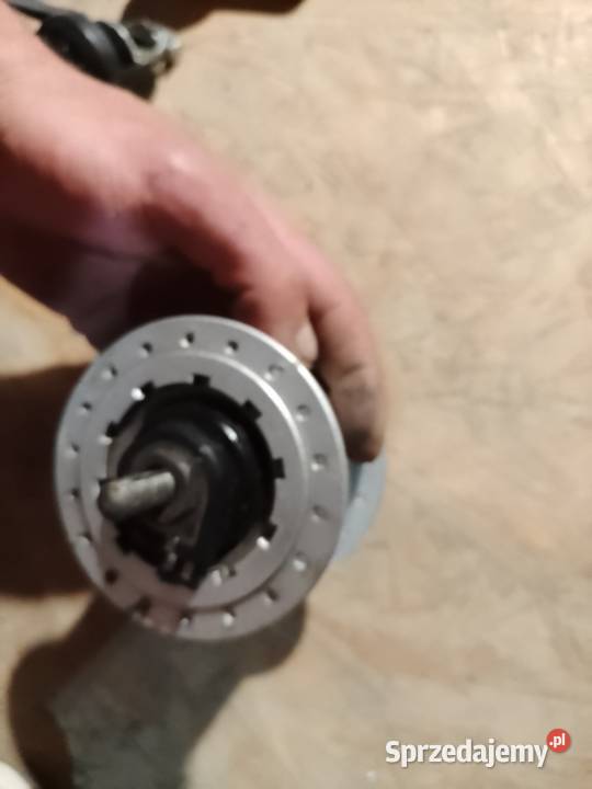 Piasta z prądnicą Shimano rolkowy hamulec Ciosaniec
