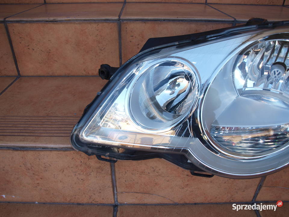 VW Polo lampa lewa przód 2005 2009r europa Oświetlenie Kalisz