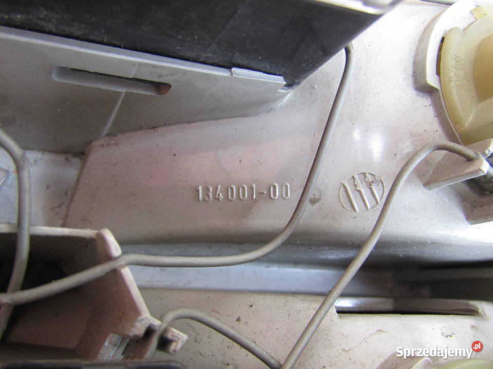 LAMPA TYLNA LEWAPRAWA W KLAPĘ BAGAŻNIKA BMW E34 Mysłaków