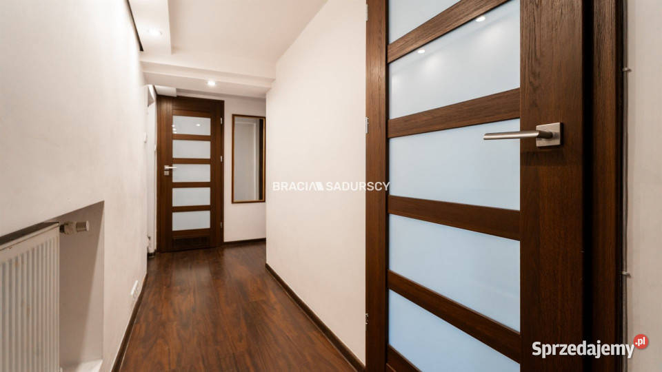 sprzedaży mieszkania Kraków Moniuszki 14673m2 miejsce parkingowe