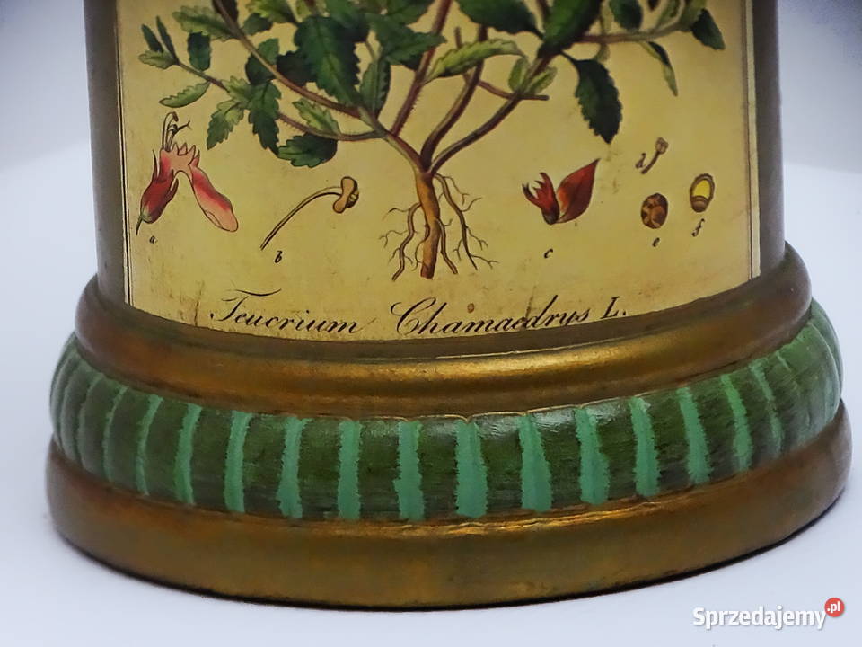 Zabytkowy pojemnik aptekarski z ilustracją