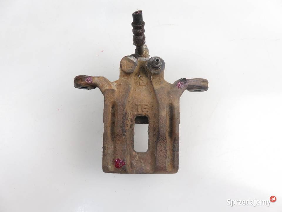 ZACISK LEWY TYŁ NISSAN PATHFINDER R51 40