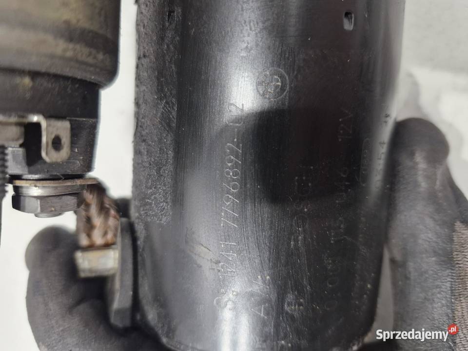 7796892 BMW E60 E65 E70 E90 ROZRUSZNIK ORYGINAŁ