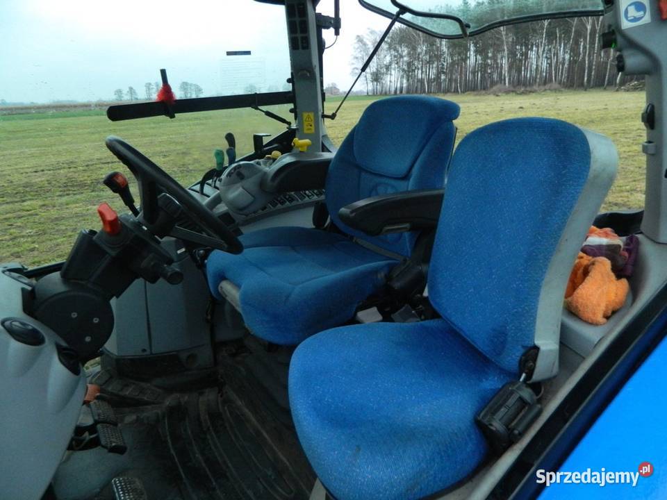 Holland T6020 Elite TuzWomTur Quicke Q55 S Ciągniki Bytów