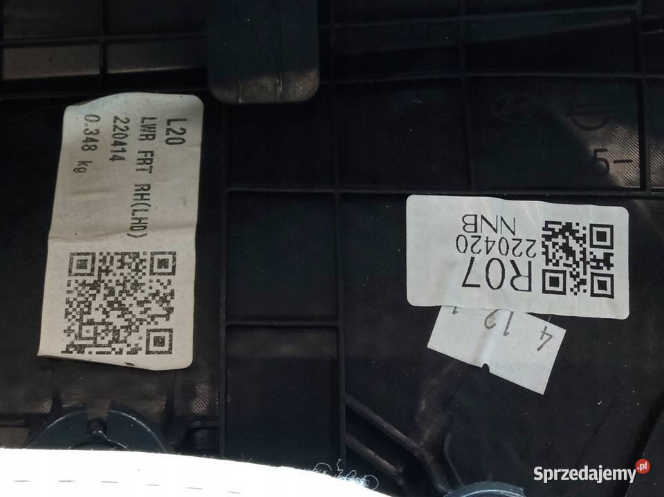 TAPICERKA BOCZEK PRAWY PRZÓD PASAŻERA 82725J3000