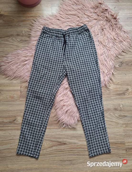 Świetne klasyczne spodnie materiałowe w kratę ze biały Kraków sprzedam