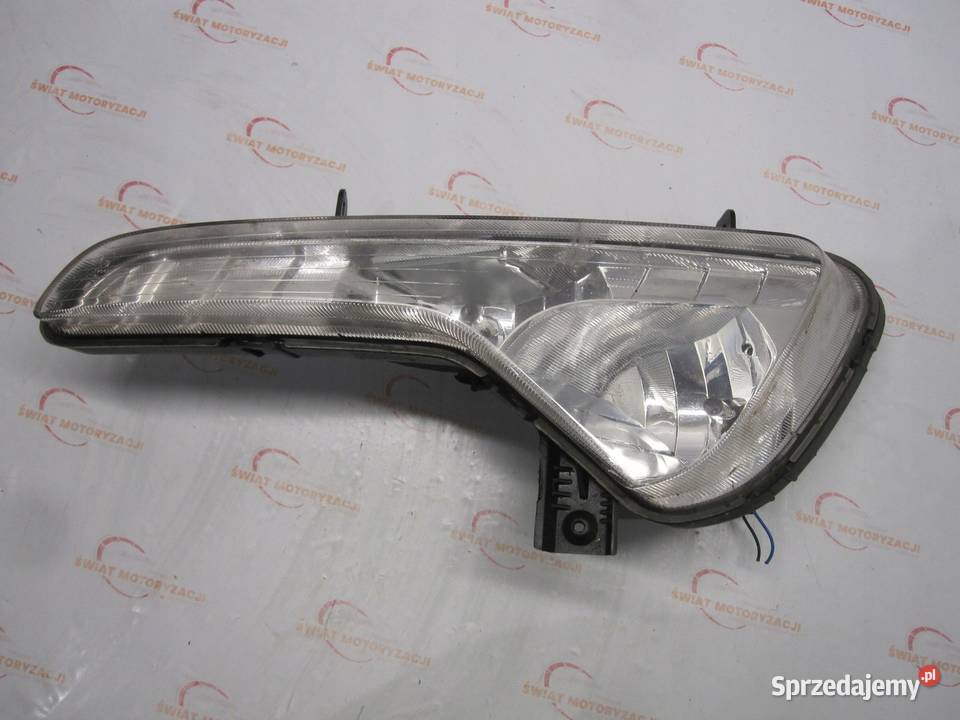 KIA SPORTAGE III 12r halogen lewy 922013W osobowe