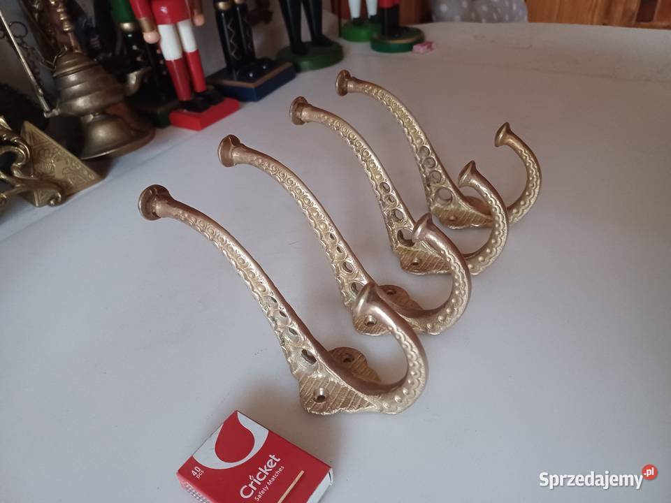 Komplet czterech masywnych wieszaków mosiężnych Poznań