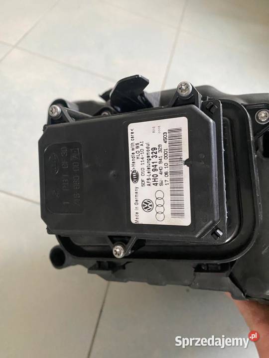 LAMPA LEWA PRZÓD VW TOUREG II 7P USZKODZONA Grzebowilk