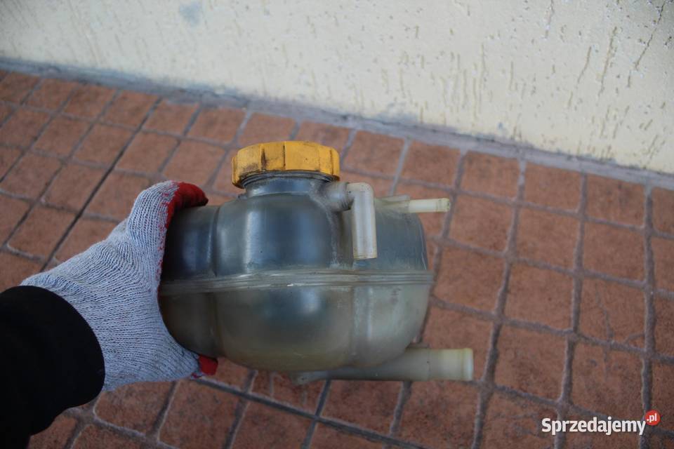 ZBIORNICZEK WYRÓWNAWCZY OPEL CORSA D 10 55702164 sprzedam