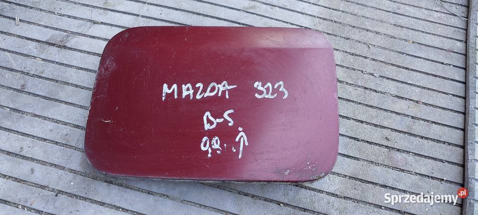 Mazda 323 f sedan 1999 20002001 klapka wlewu Byków