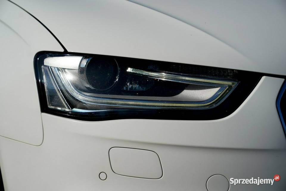 Audi A4 QUATTRO bixenonled NAWI grzane fotele relingi dachowe Otmuchów