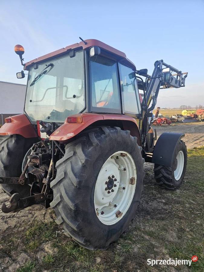 Ciągnik rolniczy holland L85 z turem Ładowacz czołowy New Holland Wólka Somiankowska