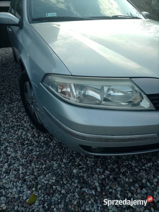 Lampy przednie reflektory Laguna