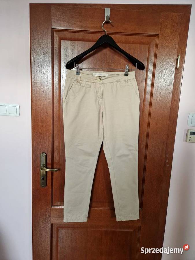 Nowe beżowe bawełniane spodnie damskie chinosy Bibice