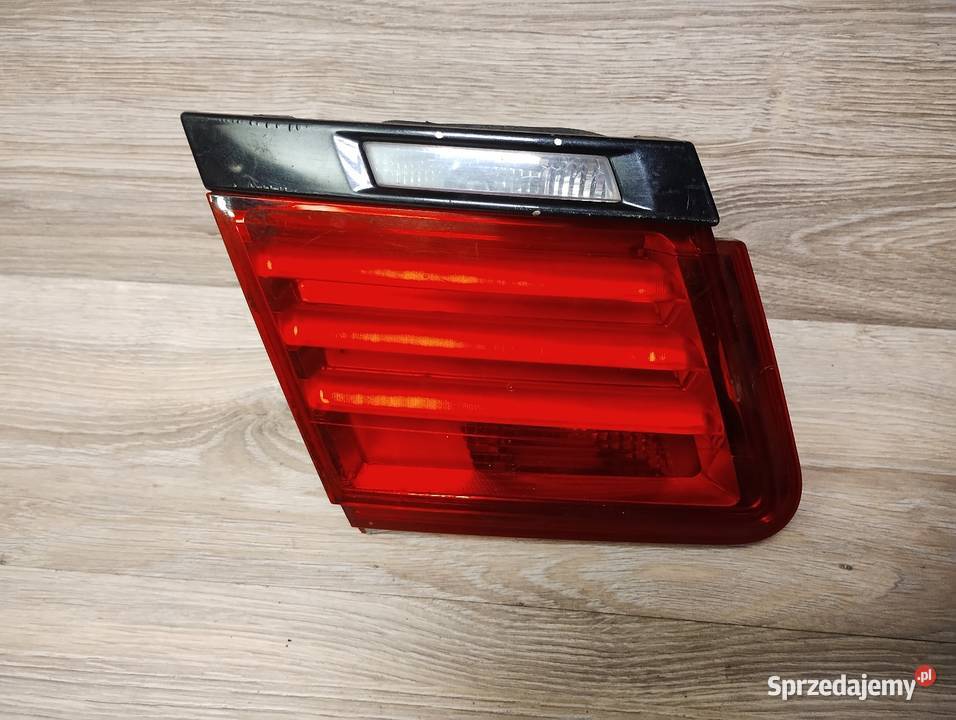 LAMPA LEWA TYLNA W KLAPE BMW F01 F02 7182205 Lampy tylne