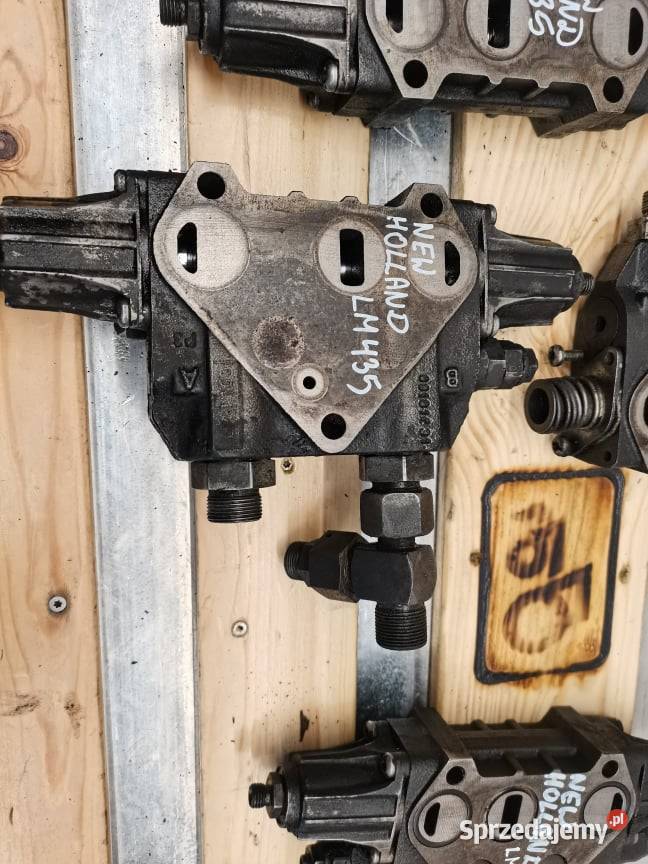 Holland LM 435 Sekcja rozdzielacza