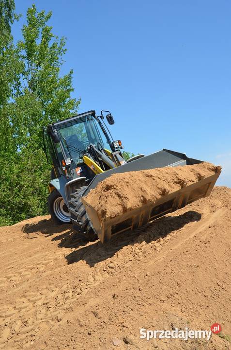Niwelacja terenu działki cennik wyrównanie Wrocław usługi budowlane