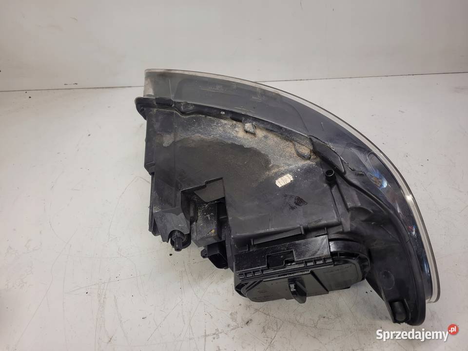 REFLEKTOR LEWY ZWYKŁY AUDI Q7 4L 4L0941003K UK Przystajń sprzedam