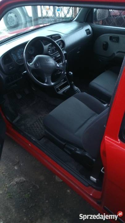 Daihatsu Cuore na kat B1 czerwony