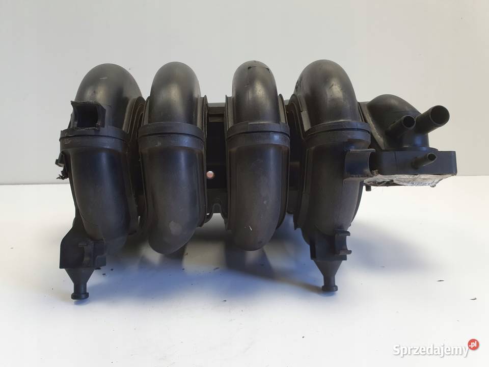 VW Fox 14 B KOLEKTOR SSĄCY 030129711CF Silniki i osprzęt Chełm