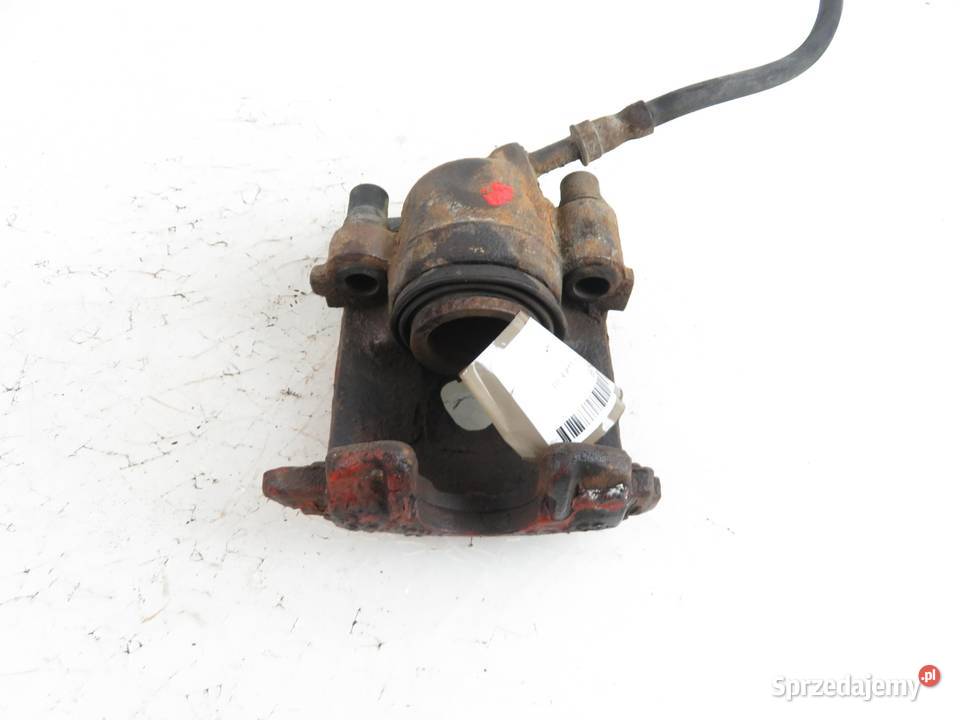 ZACISK PRAWY PRZÓD VW GOLF III 14 1H0615124C