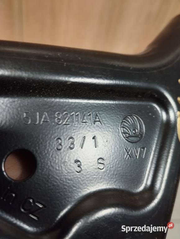 Skoda Rapid mocowanie wspornik błotnika prawy