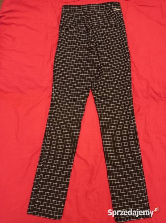 Spodnie w kratkę marki HM Hajnówka