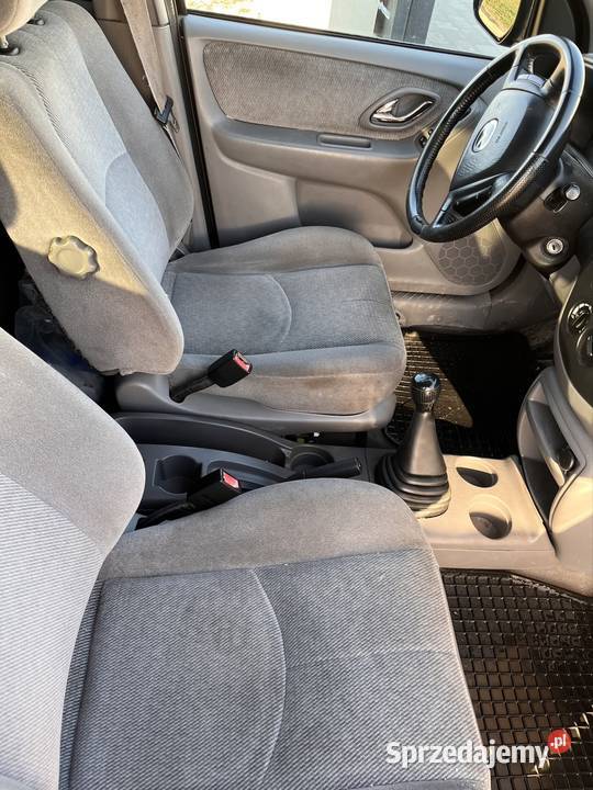 Mazda Tribute 4x4 benzyna hak benzyna klima kupiony w Polsce mazowieckie
