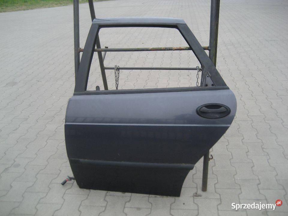 saab 900 9396r drzwi tył lewe prawe osobowe Drzwi Rakoniewice