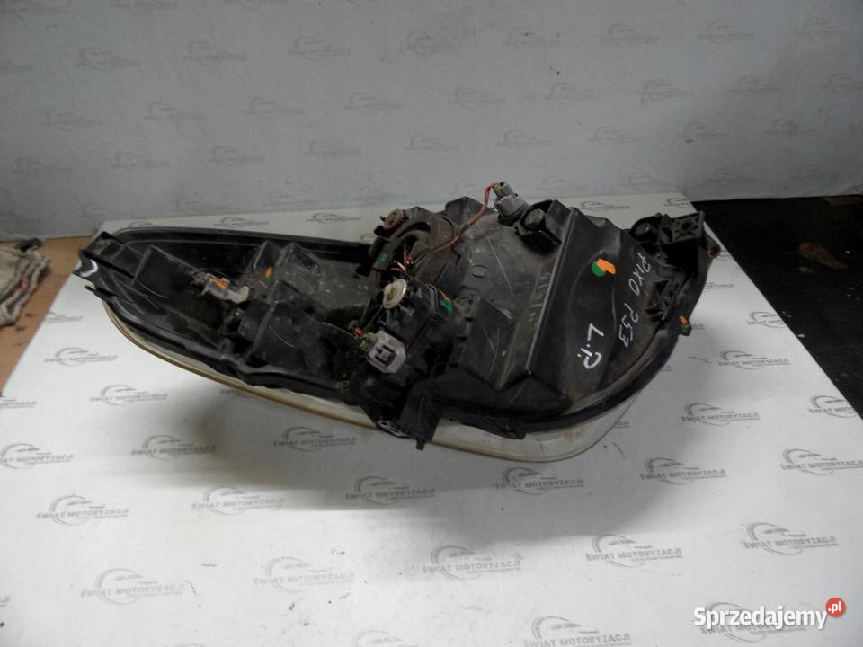 NISSAN PIXO 10r lampa lewa przód ANGLIK