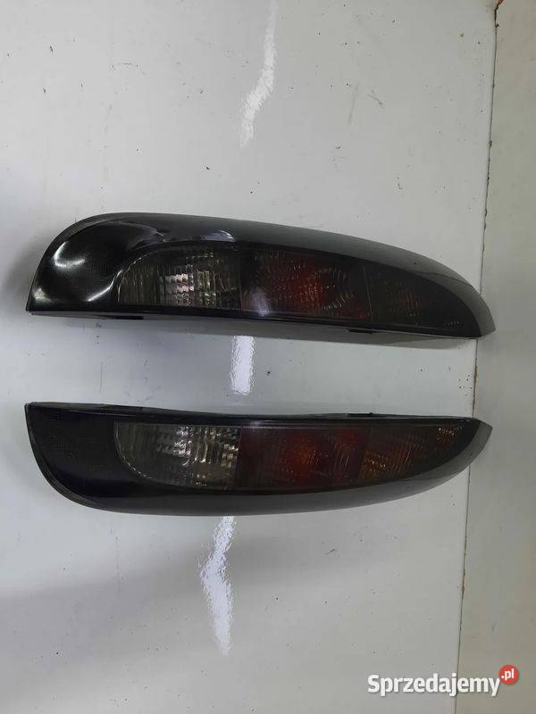 323G OPEL CORSA C CZARNA LAMPA LEWA PRAWA TYLNA osobowe Włoszczowa