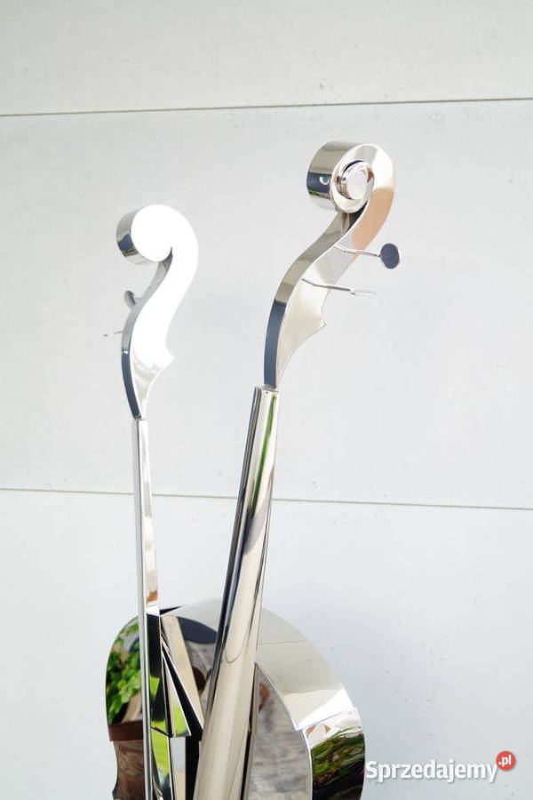 Srebrne skrzypce stal nierdzewna na marmurze Gizałki