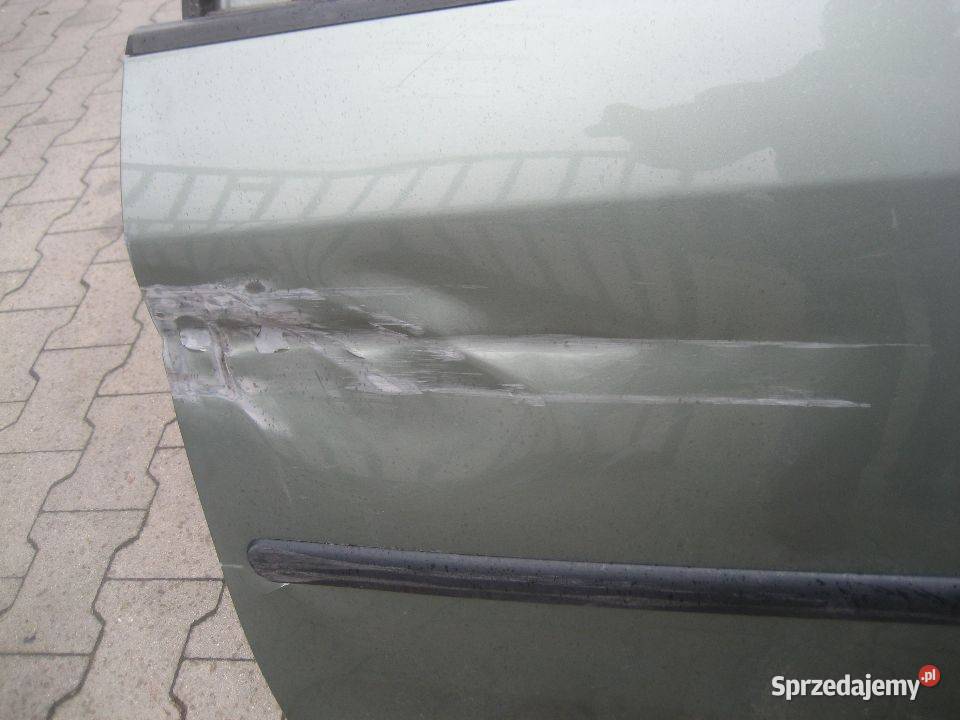 vw caddy 0314r drzwi przód lewe uszkodzone osobowe Rakoniewice