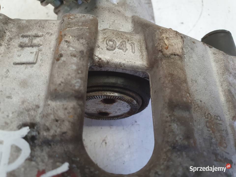 Volvo V40 II TYLNY ZACISK HAMULCOWY lewy tył