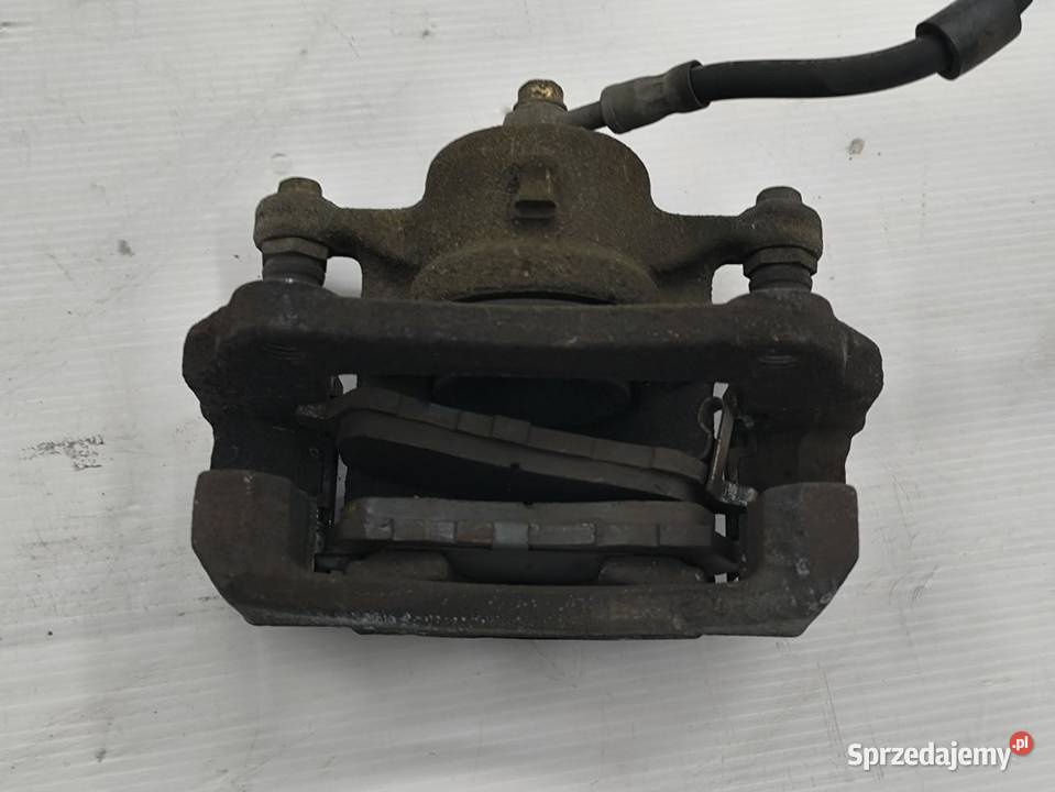 ZACISK PRAWY PRZÓD FORD FIESTA MK7 LIFT 10 osobowe