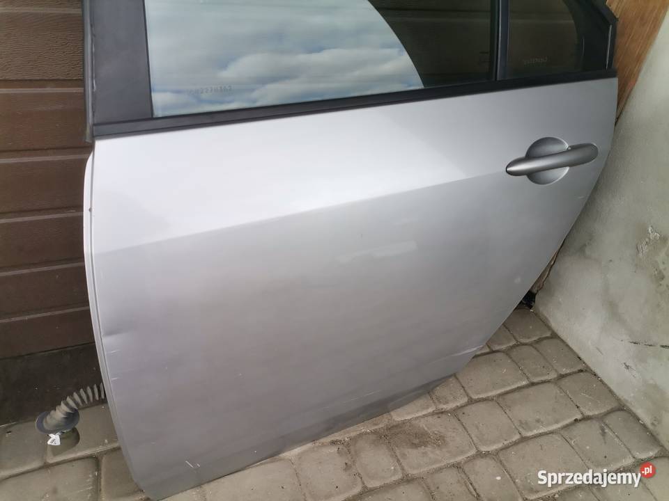 NISSAN PRIMERA P12 HB DRZWI LEWY TYŁ KY0G Nowy Sącz