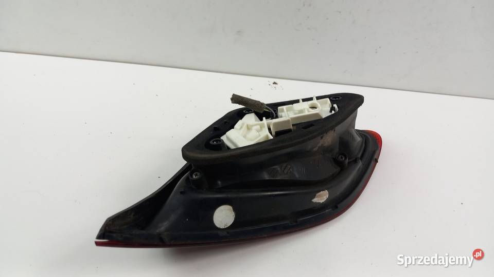 OPEL ASTRA J HB LAMPA TYŁ LEWA W KLAPĘ sprzedam