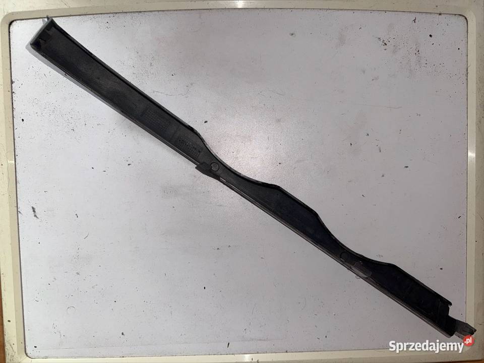 Osłona pod lampę przód lewa Bmw e46